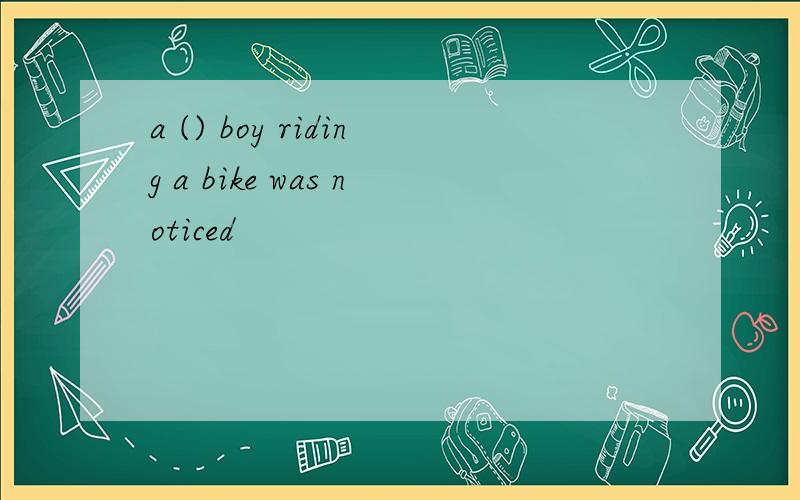 a () boy riding a bike was noticed